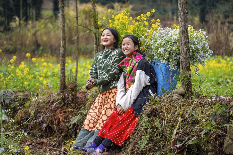 La belleza de la gente combinada con el paisaje también es una atracción para los turistas en Ha Giang.