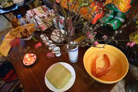 La ofrenda dedicada a los dioses de la cocina (Fotografía: VNA) La ofrenda dedicada a los dioses de la cocina (Fotografía: VNA)