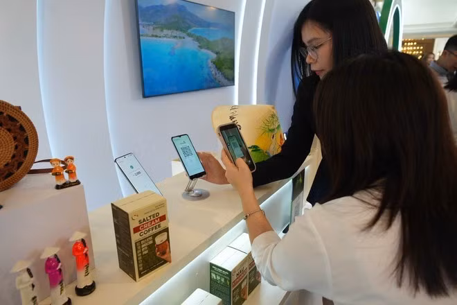 A partir de hoy, el 3 de abril, más de mil millones de chinos pueden realizar pagos fácilmente en Vietnam utilizando Alipay. (Foto: Vietnam+)
