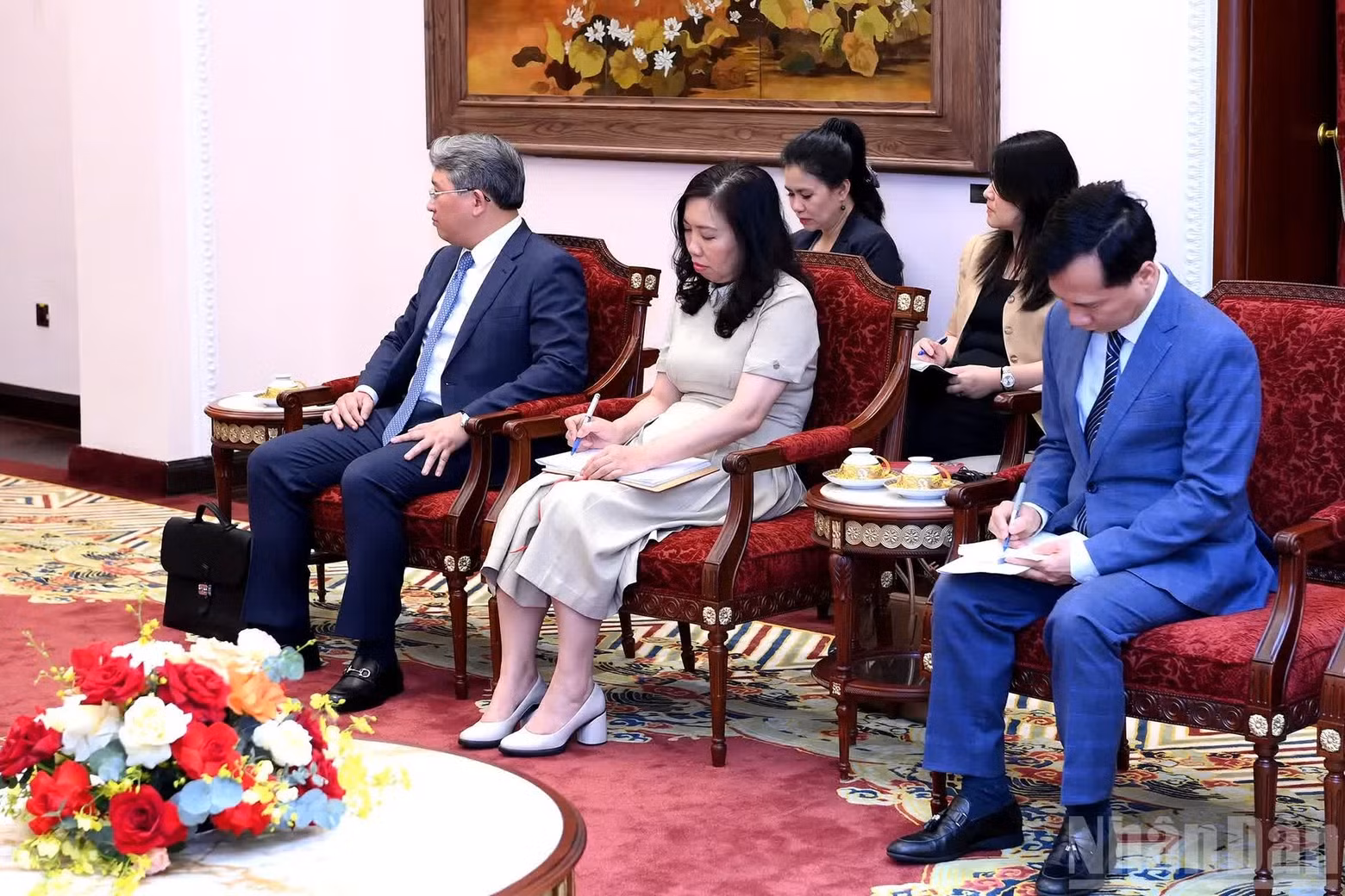 Delegados a la recepción.