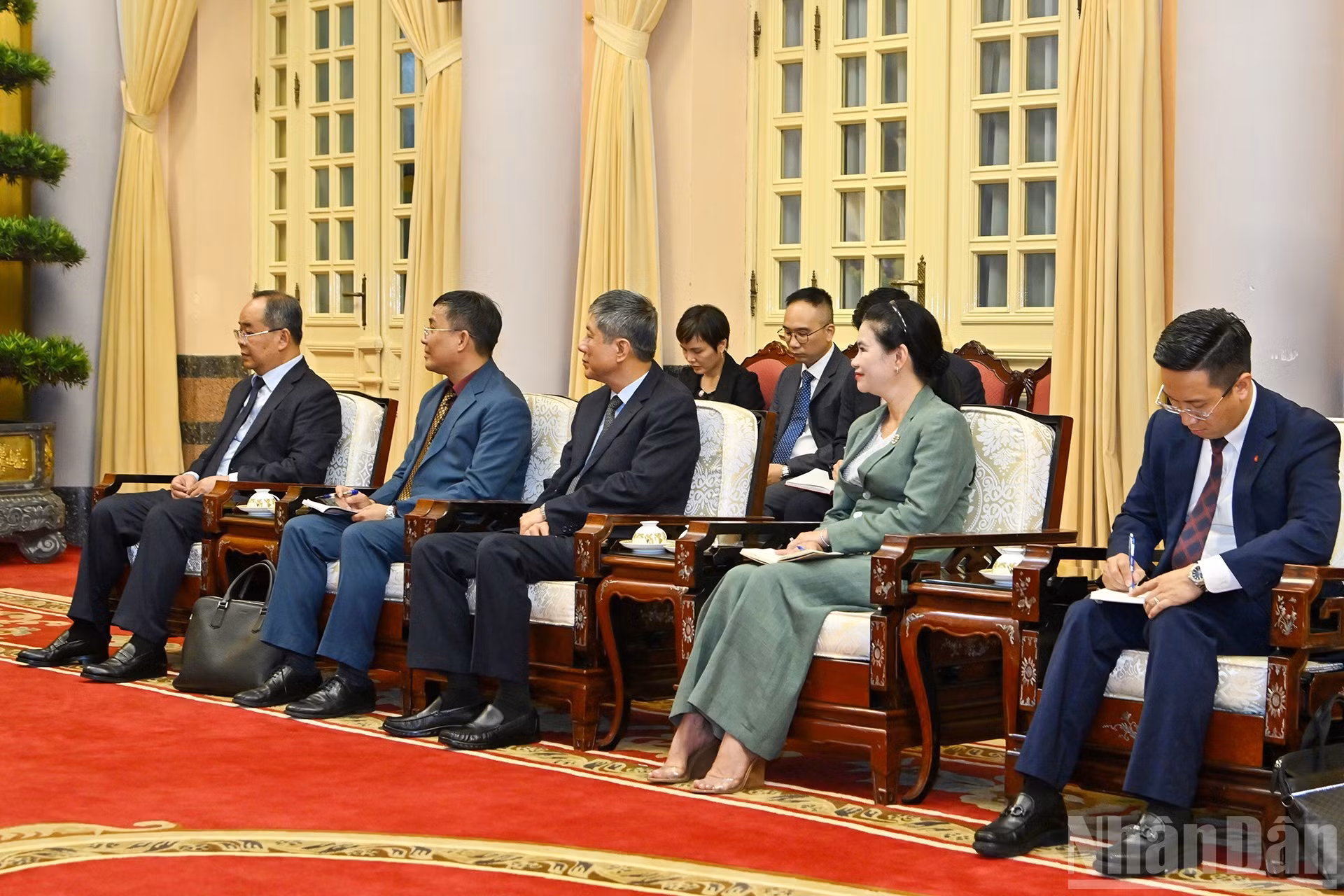 Delegados vietnamitas presentes en el acto.